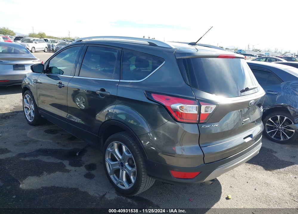 2017 FORD ESCAPE TITANIUM VIN: 1FMCU0J99HUD85315