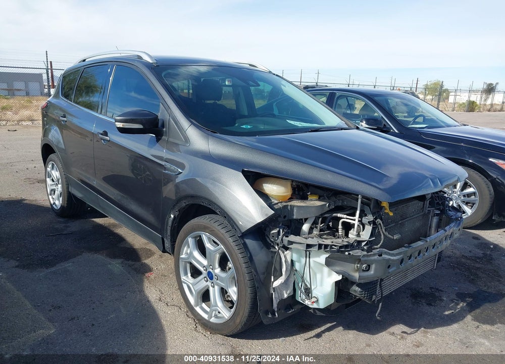 2017 FORD ESCAPE TITANIUM VIN: 1FMCU0J99HUD85315