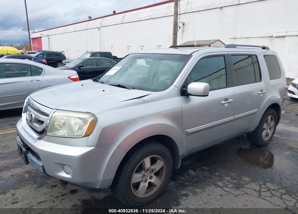 2011 HONDA PILOT EX-L VIN: 5FNYF4H64BB054519