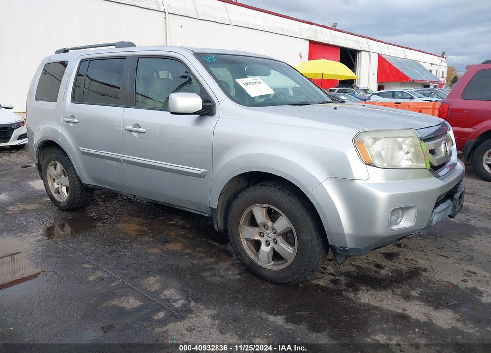 2011 HONDA PILOT EX-L VIN: 5FNYF4H64BB054519