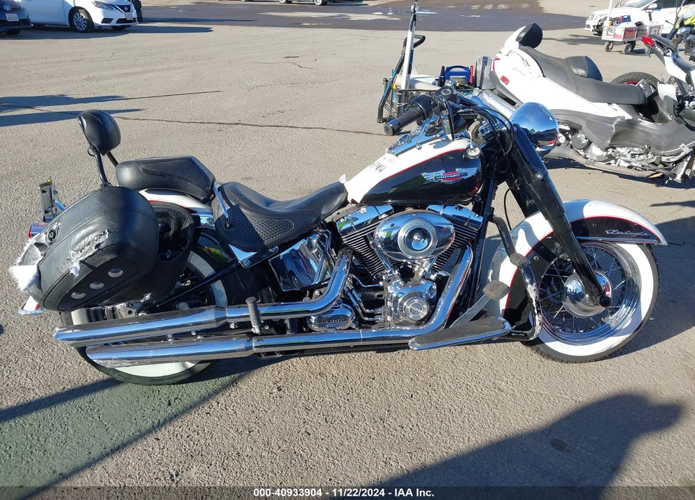 2011 HARLEY-DAVIDSON FLSTN VIN: 1HD1JD519BB014219