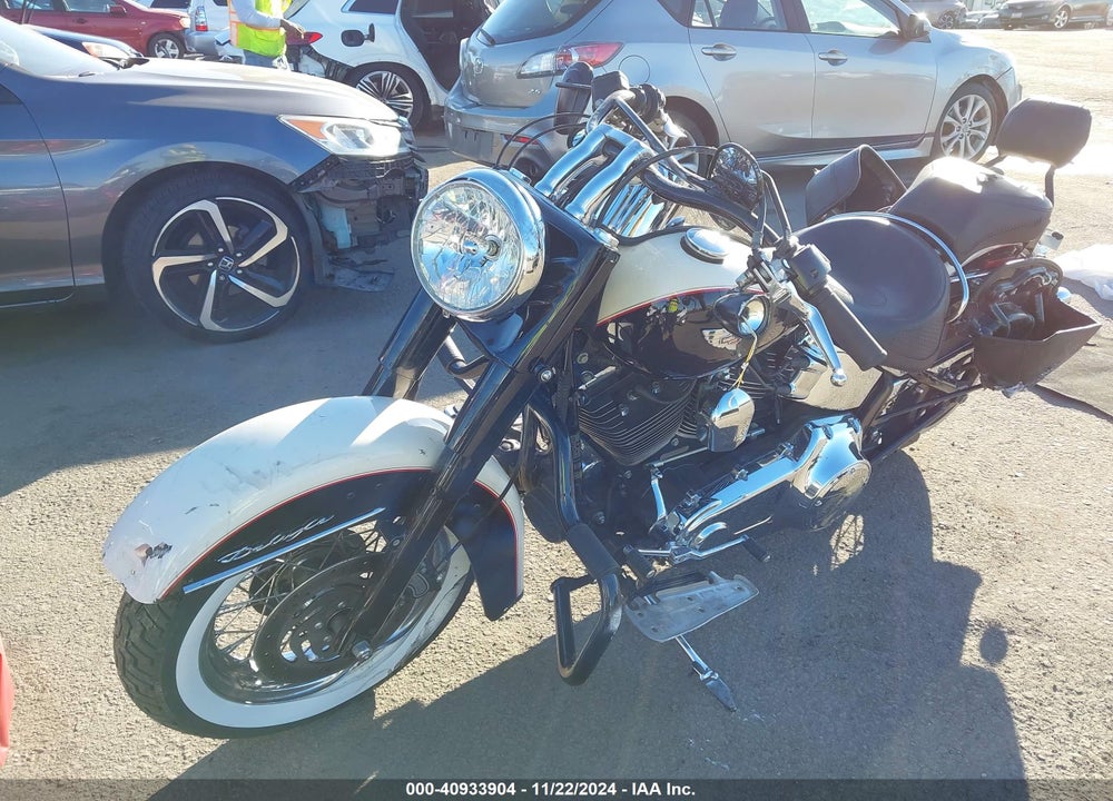 2011 HARLEY-DAVIDSON FLSTN VIN: 1HD1JD519BB014219