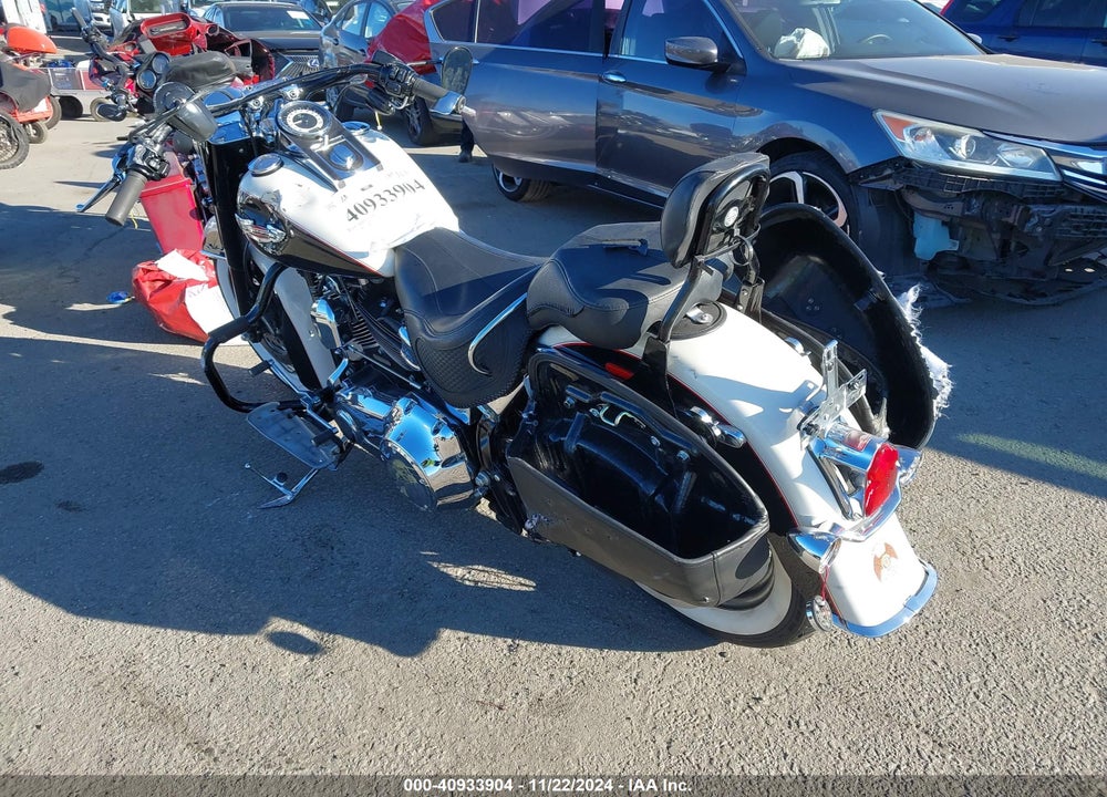 2011 HARLEY-DAVIDSON FLSTN VIN: 1HD1JD519BB014219