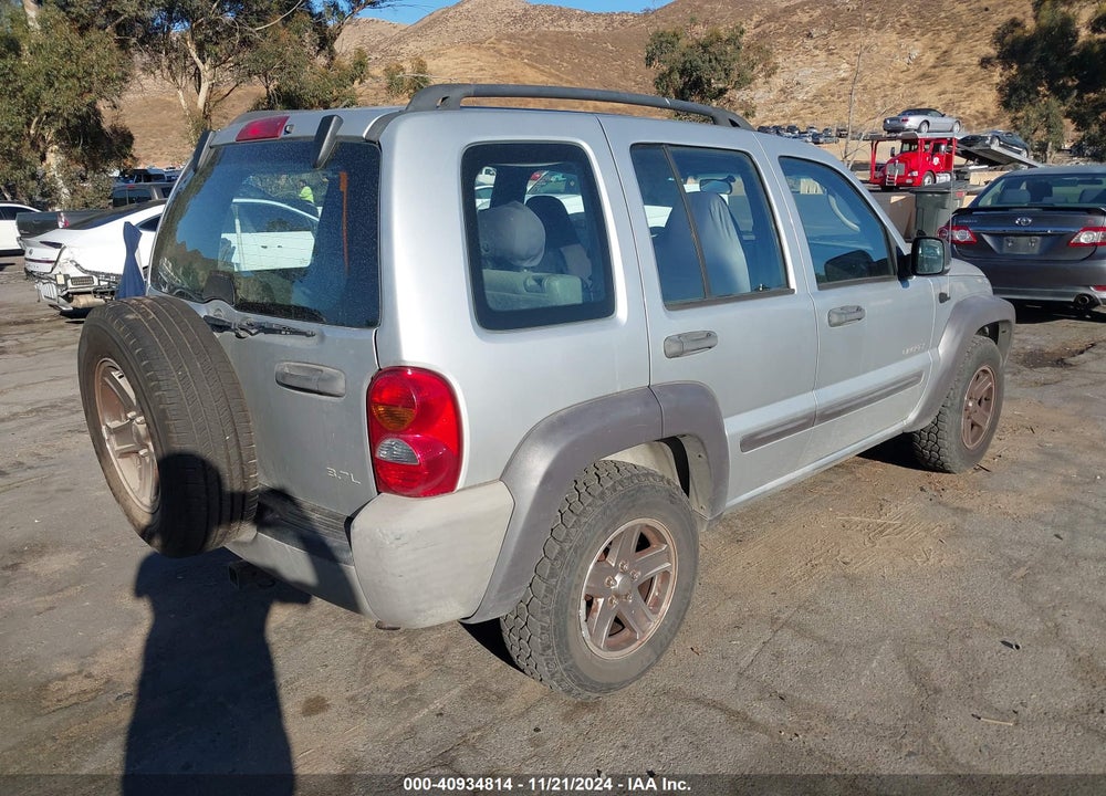 2004 JEEP LIBERTY SPORT VIN: 1J4GL48K74W217089