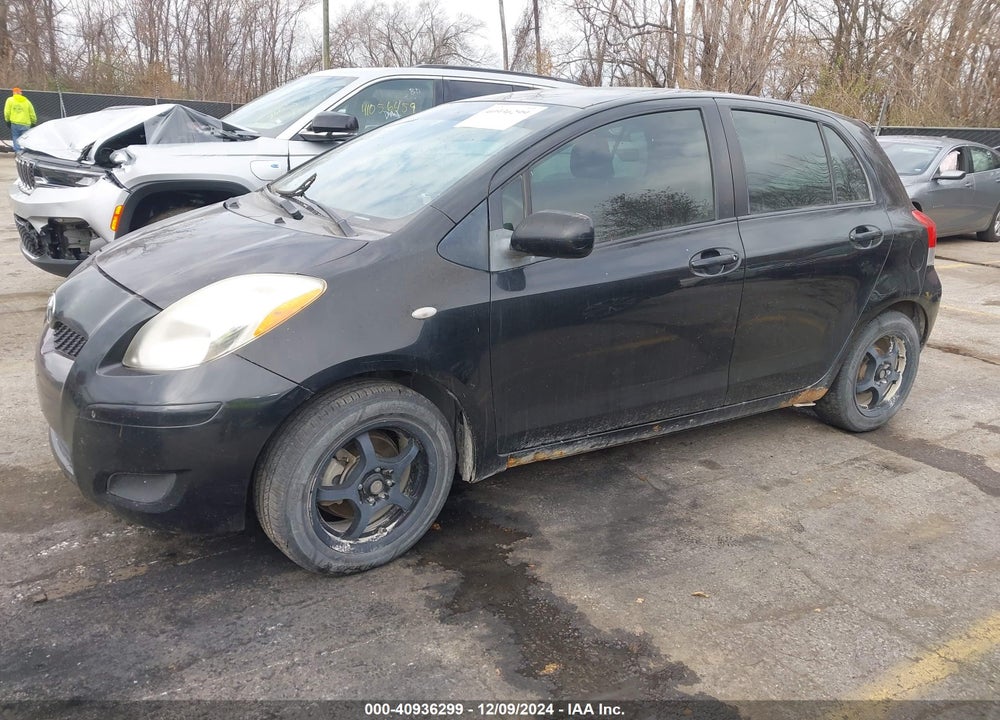 2009 TOYOTA YARIS VIN: JTDKT903295230122