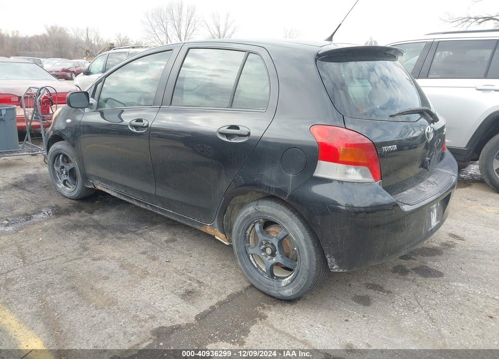 2009 TOYOTA YARIS VIN: JTDKT903295230122