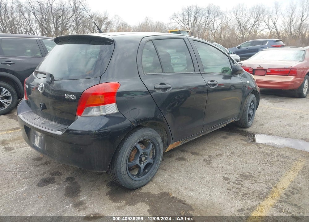2009 TOYOTA YARIS VIN: JTDKT903295230122