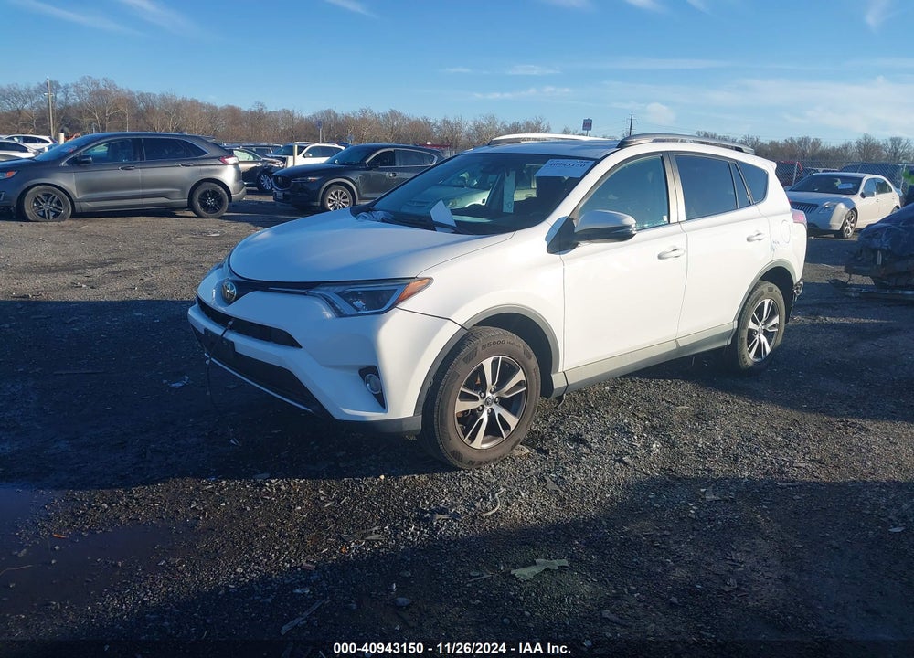 2018 TOYOTA RAV4 ADVENTURE/XLE VIN: 2T3RFREV0JW703786
