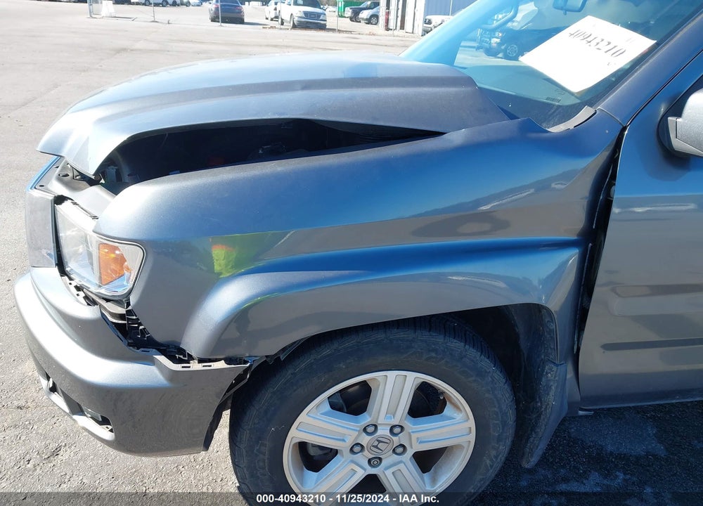 2011 HONDA RIDGELINE RTL VIN: 5FPYK1F57BB455140