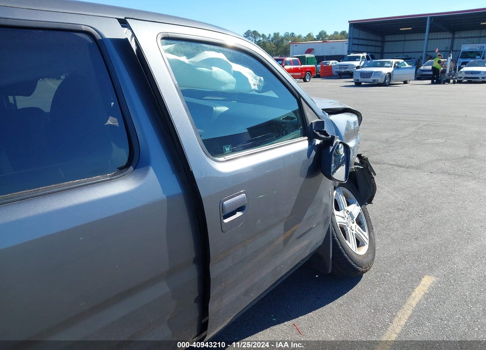 2011 HONDA RIDGELINE RTL VIN: 5FPYK1F57BB455140