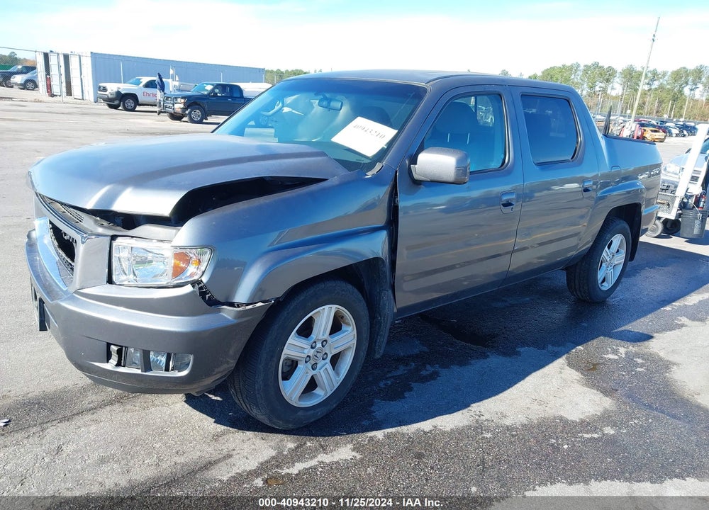 2011 HONDA RIDGELINE RTL VIN: 5FPYK1F57BB455140