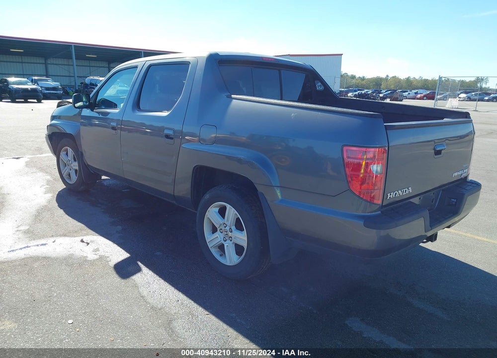 2011 HONDA RIDGELINE RTL VIN: 5FPYK1F57BB455140