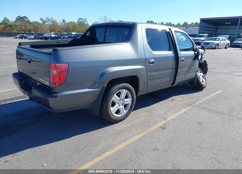 2011 HONDA RIDGELINE RTL VIN: 5FPYK1F57BB455140