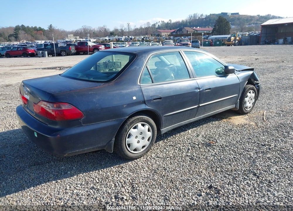2000 HONDA ACCORD 2.3 LX VIN: 1HGCG6657YA136079