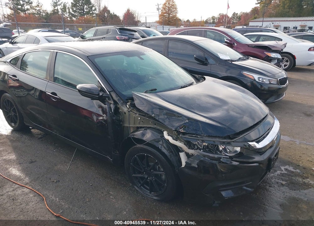 2018 HONDA CIVIC LX VIN: 2HGFC2F5XJH602239