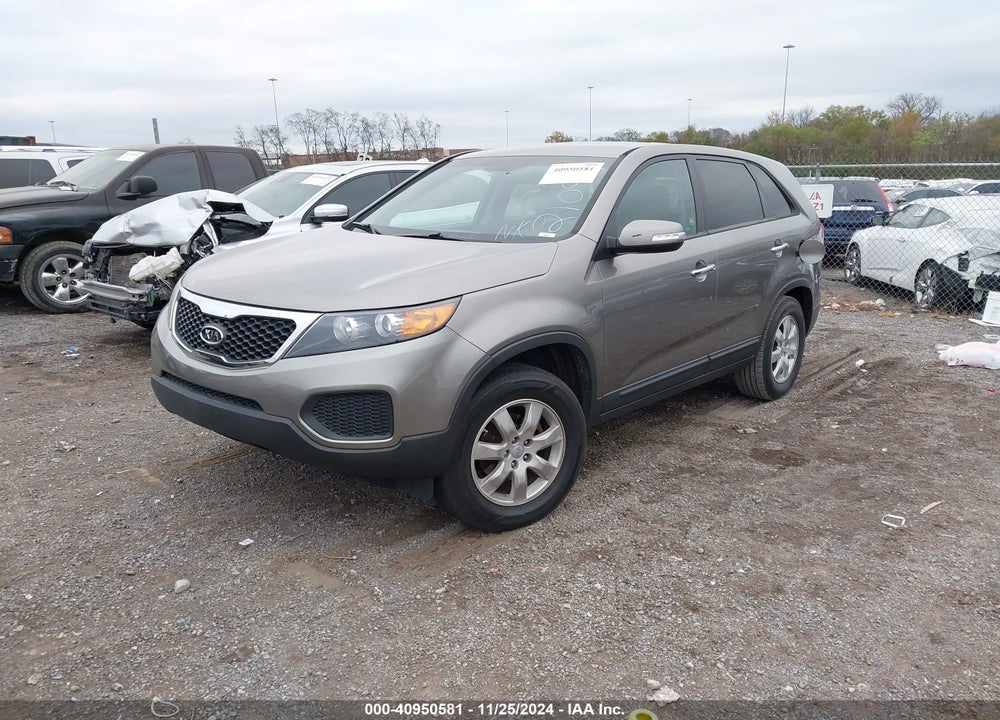 2012 KIA SORENTO LX VIN: 5XYKT3A11CG210999