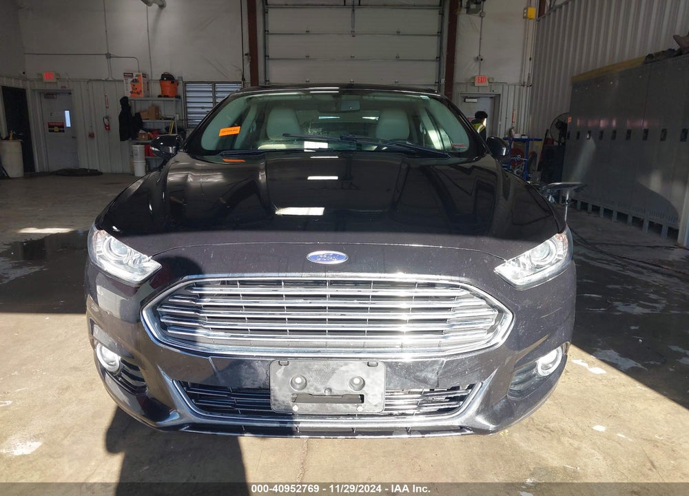 2014 FORD FUSION HYBRID TITANIUM VIN: 3FA6P0RU9ER377936