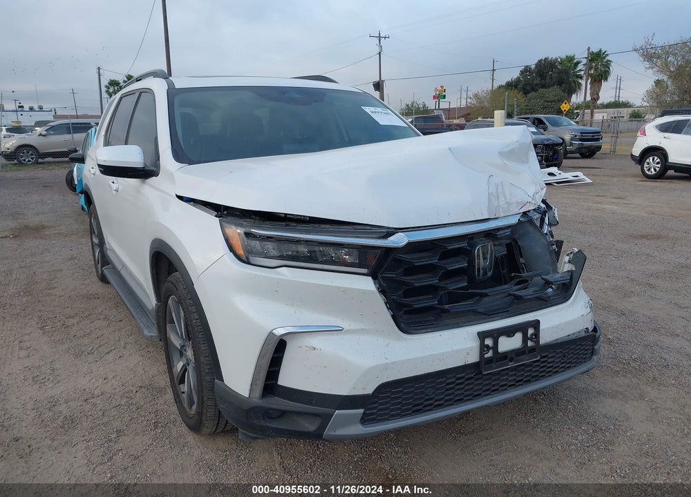 2024 HONDA PILOT TOURING VIN: 5FNYG1H73RB031862