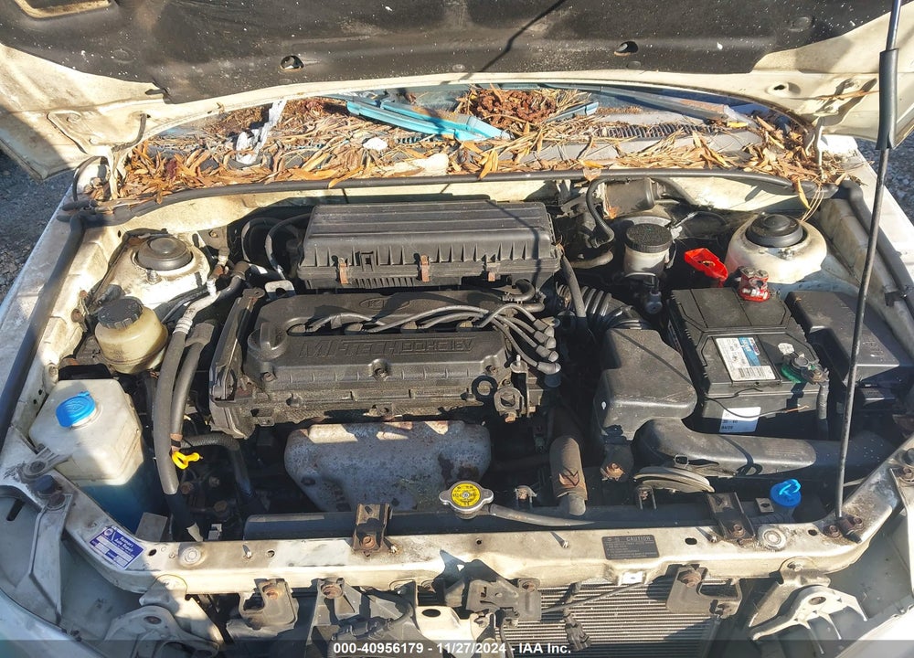 2002 KIA RIO VIN: KNADC123026201318
