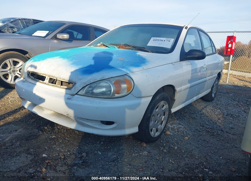 2002 KIA RIO VIN: KNADC123026201318