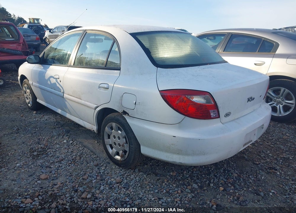2002 KIA RIO VIN: KNADC123026201318