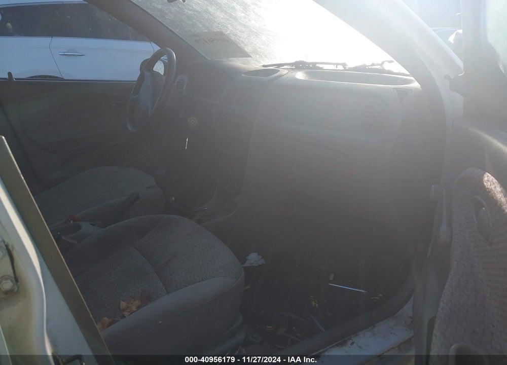 2002 KIA RIO VIN: KNADC123026201318