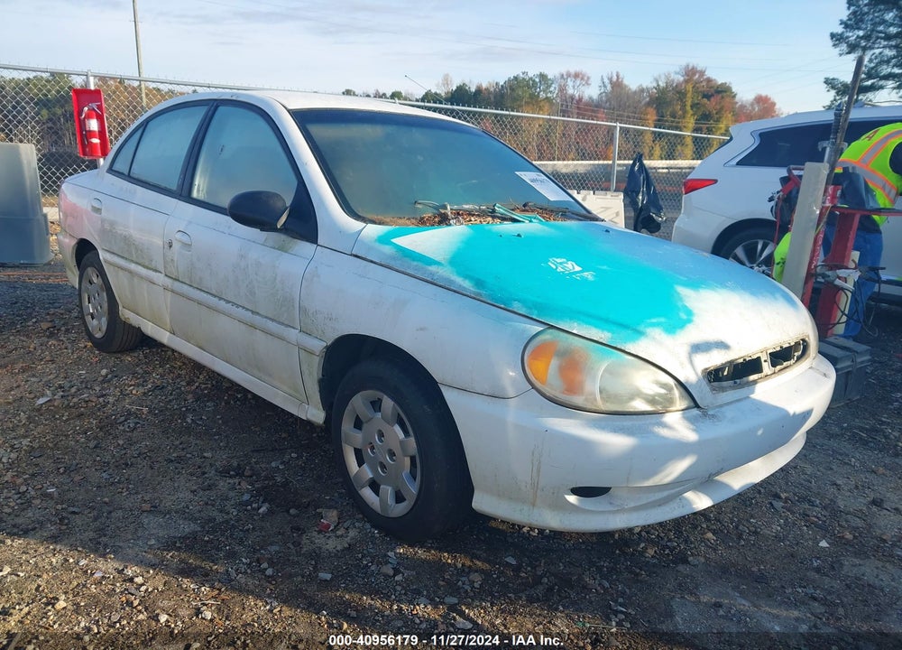 2002 KIA RIO VIN: KNADC123026201318