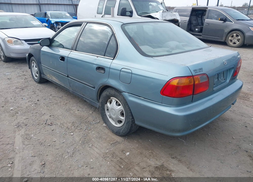2000 HONDA CIVIC LX VIN: 1HGEJ6677YL054109