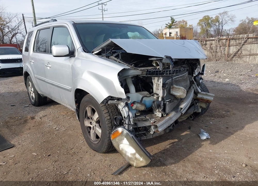 2011 HONDA PILOT EX-L VIN: 5FNYF4H50BB068358