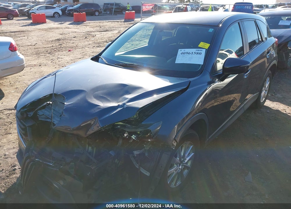 2016 MAZDA CX-5 TOURING VIN: JM3KE2CYXG0692194