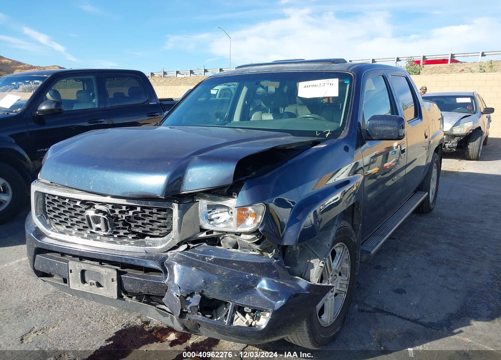 2011 HONDA RIDGELINE RTL VIN: 5FPYK1F59BB451770