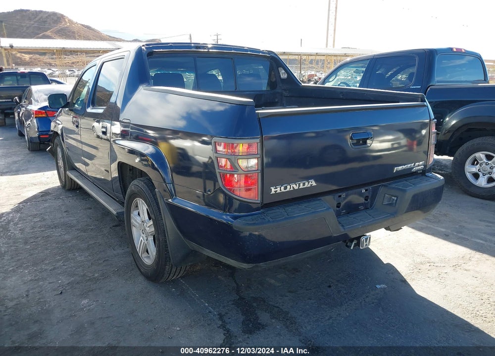 2011 HONDA RIDGELINE RTL VIN: 5FPYK1F59BB451770