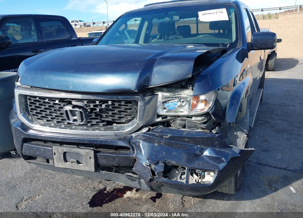 2011 HONDA RIDGELINE RTL VIN: 5FPYK1F59BB451770
