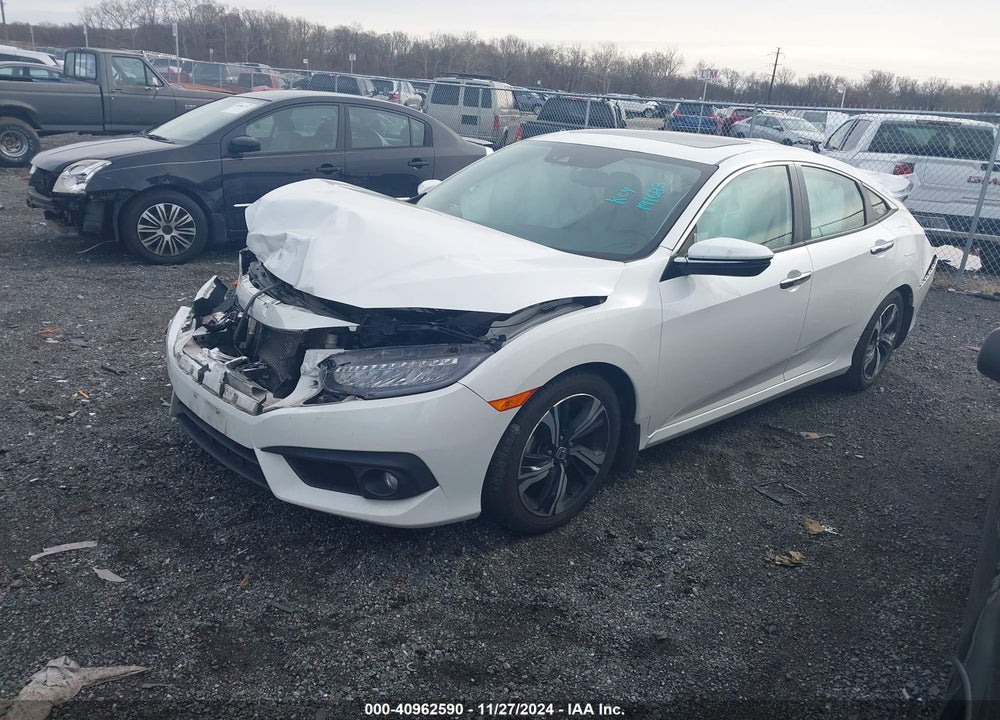 2017 HONDA CIVIC TOURING VIN: 19XFC1F94HE210066