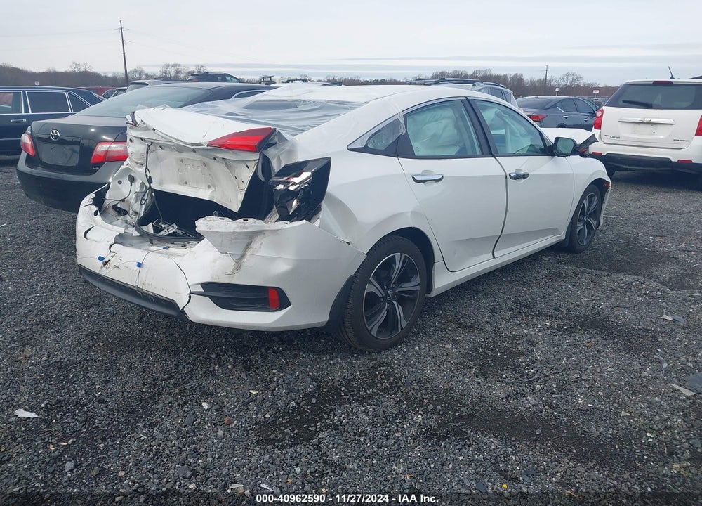 2017 HONDA CIVIC TOURING VIN: 19XFC1F94HE210066
