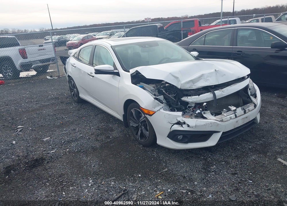 2017 HONDA CIVIC TOURING VIN: 19XFC1F94HE210066