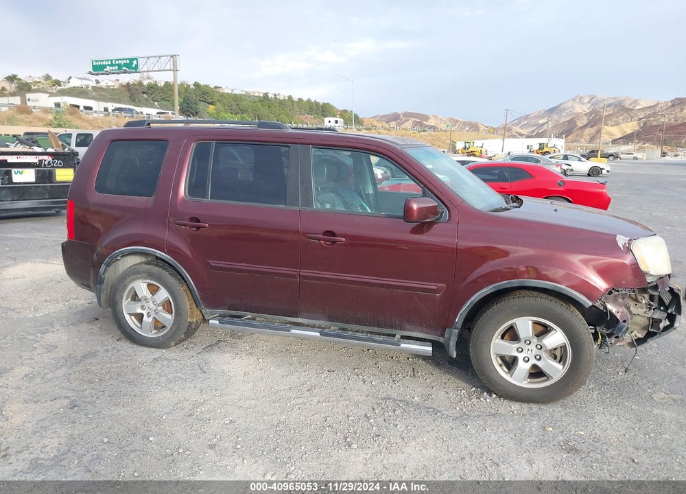 2011 HONDA PILOT EX-L VIN: 5FNYF4H52BB037290