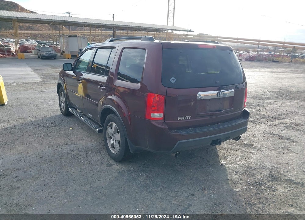 2011 HONDA PILOT EX-L VIN: 5FNYF4H52BB037290
