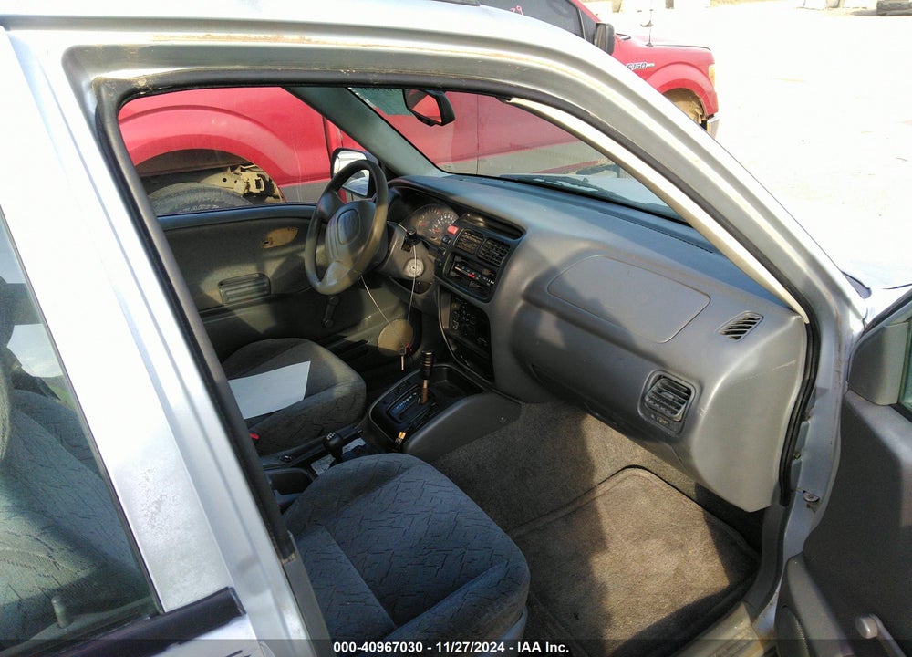 1999 CHEVROLET TRACKER VIN: 2CNBJ13C3X6930604