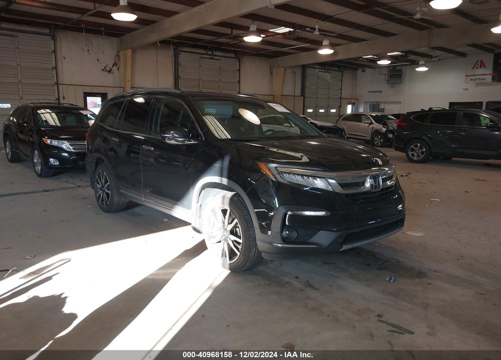 2022 HONDA PILOT 2WD TOURING 7 PASSENGER VIN: 5FNYF5H60NB013377