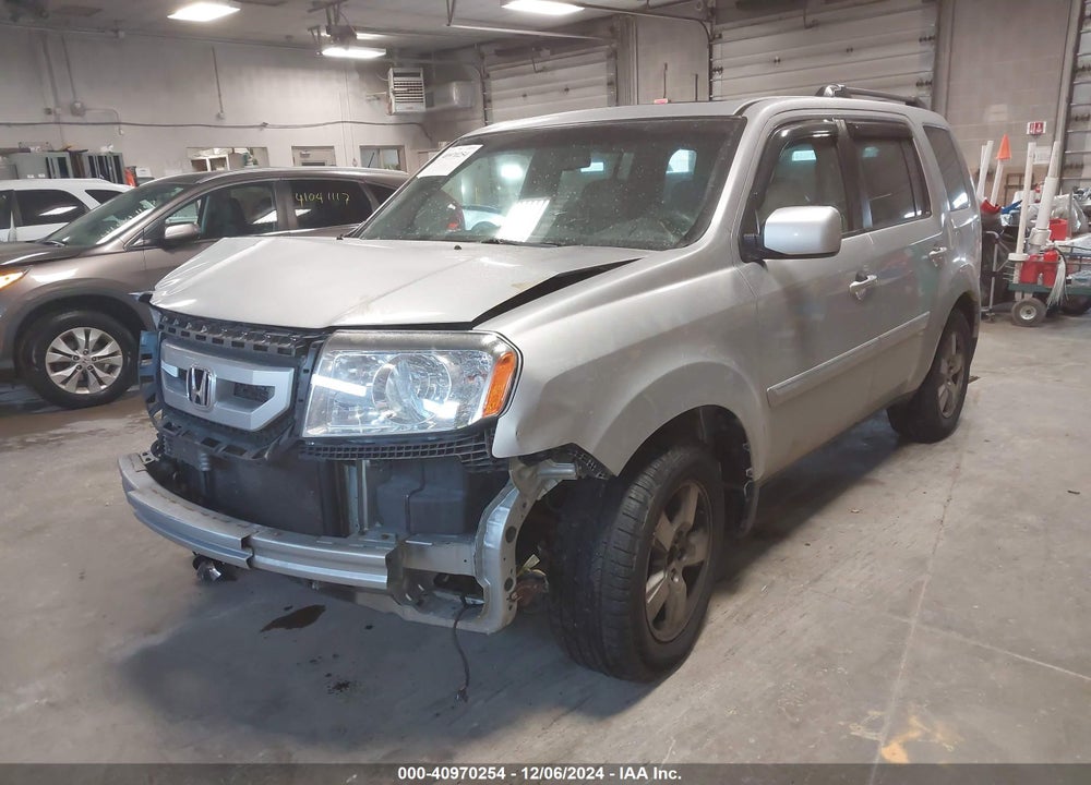 2011 HONDA PILOT EX-L VIN: 5FNYF4H52BB020473