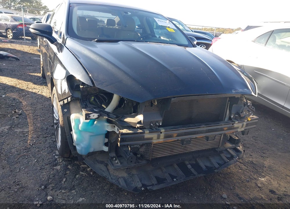 2016 FORD FUSION TITANIUM VIN: 3FA6P0K94GR347039