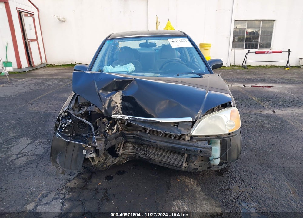 2002 HONDA CIVIC LX VIN: 2HGES165X2H557359