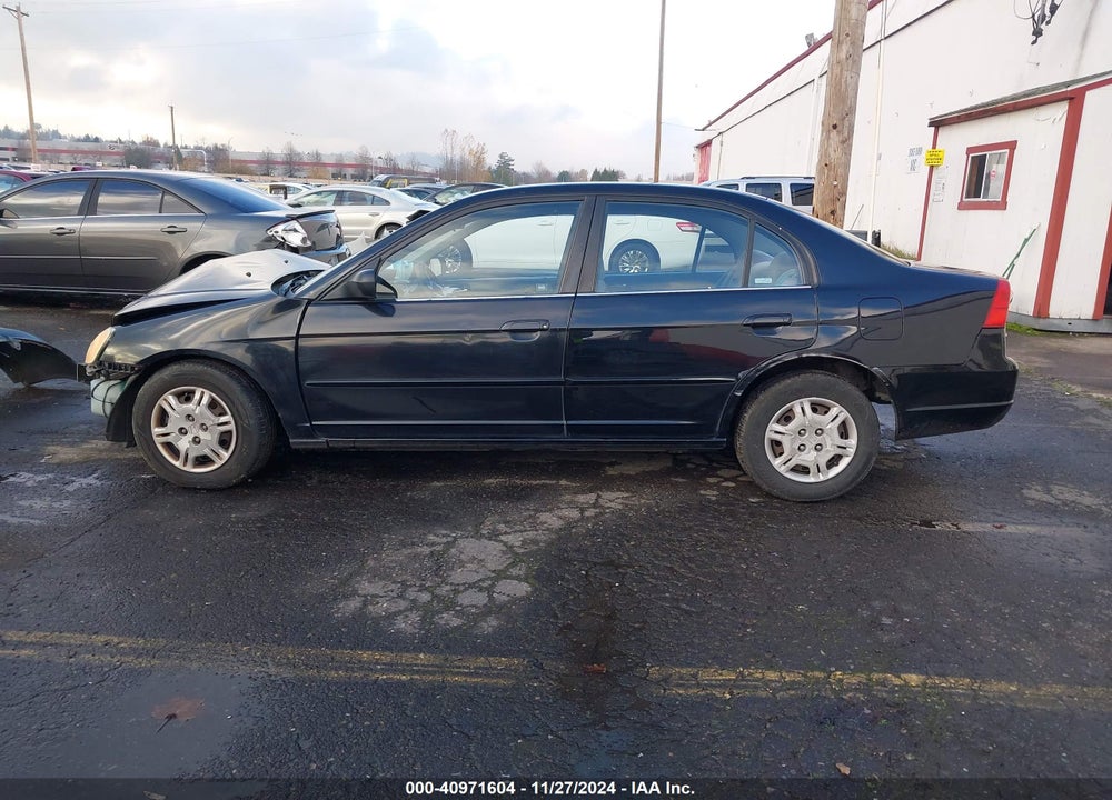 2002 HONDA CIVIC LX VIN: 2HGES165X2H557359