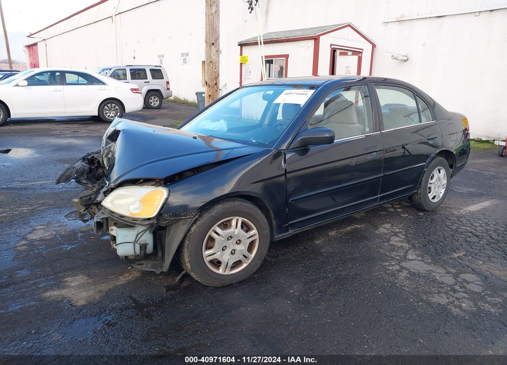 2002 HONDA CIVIC LX VIN: 2HGES165X2H557359