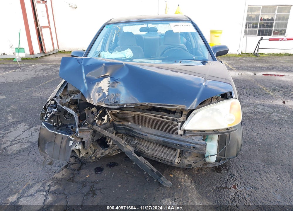 2002 HONDA CIVIC LX VIN: 2HGES165X2H557359