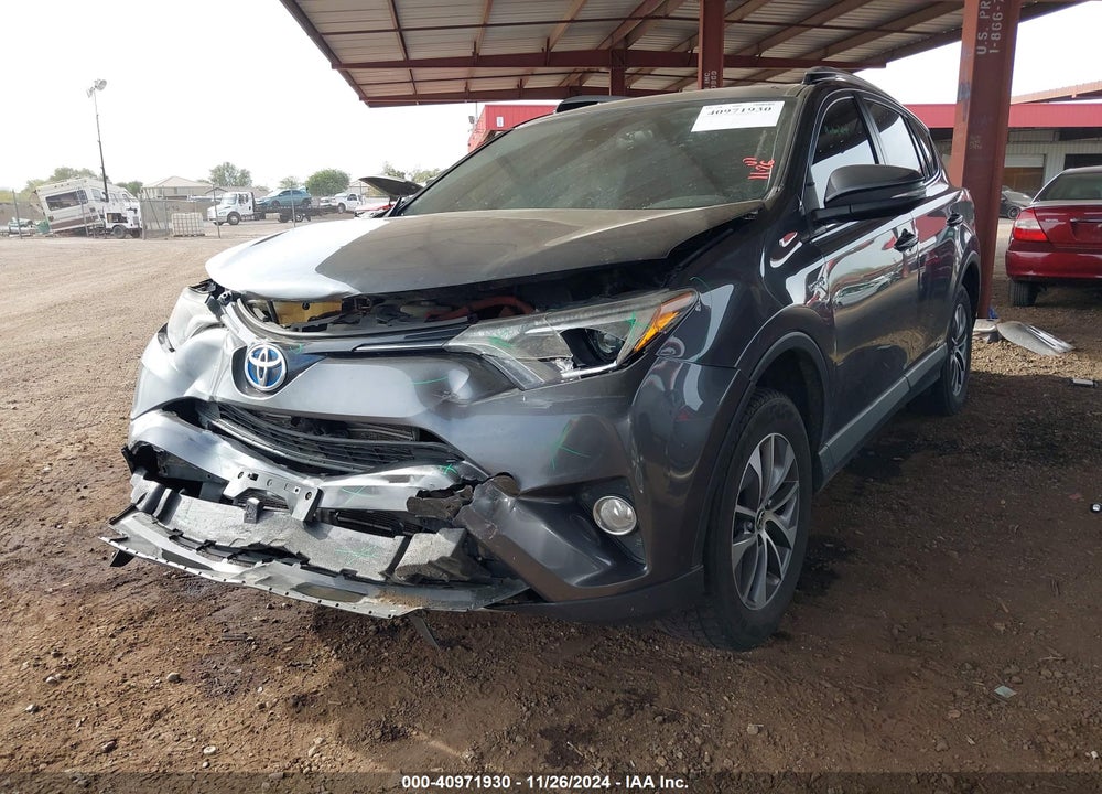 2016 TOYOTA RAV4 HYBRID XLE VIN: JTMRJREV2GD010433