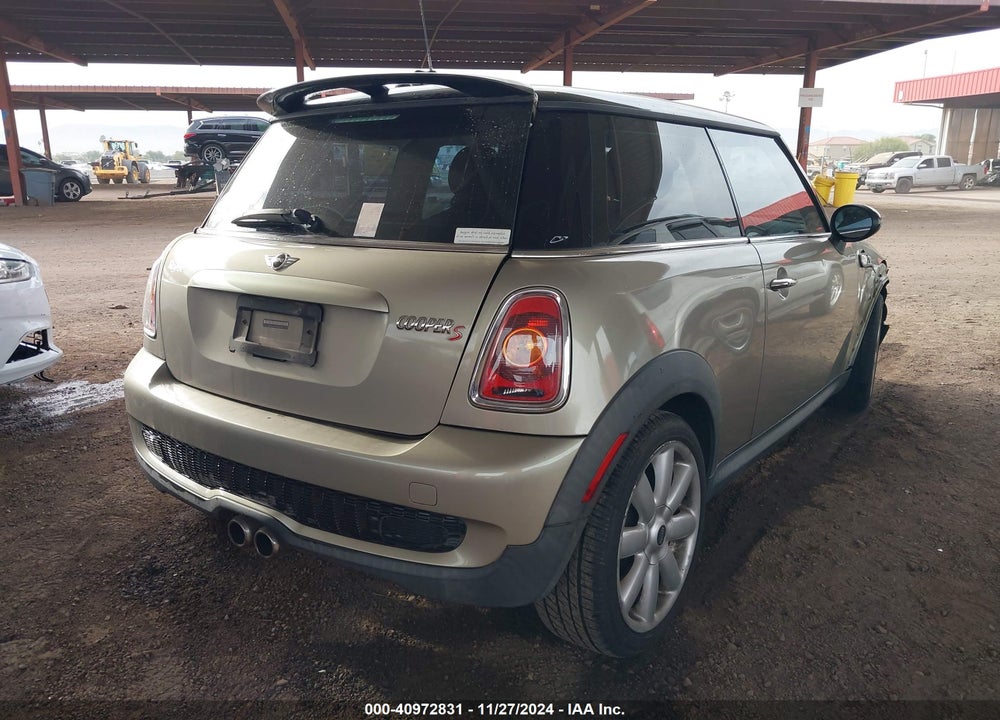2009 MINI COOPER S VIN: WMWMF73539TW83059