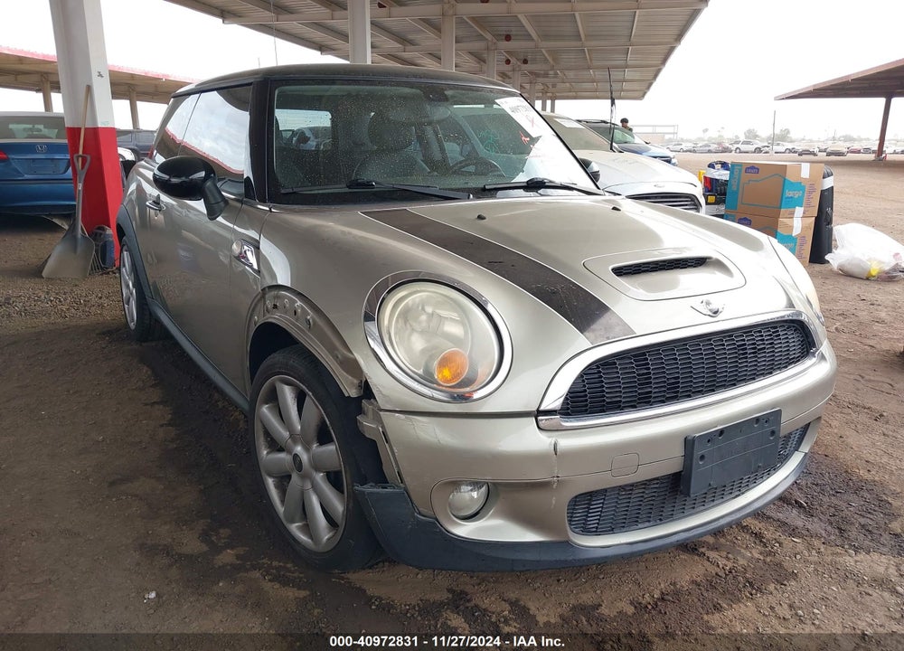 2009 MINI COOPER S VIN: WMWMF73539TW83059
