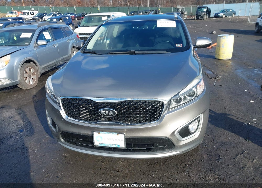 2016 KIA SORENTO 3.3L EX VIN: 5XYPH4A58GG152055